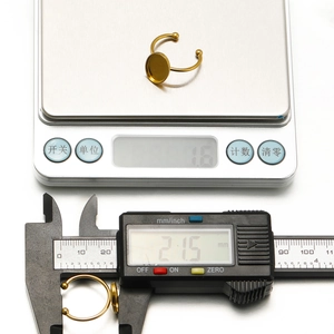 Adjustable golden stainless steel ring base with flat round setting tray for DIY jewelry