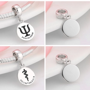 Detailed view of S925 sterling silver Psi and Odontologia charms for DIY bracelets