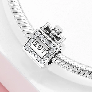 S925 sterling silver perfume bottle charm with EDT engraving and sparkling cubic zirconia