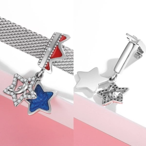 925 silver dolphin and star dangle charm with blue enamel on a mesh bracelet