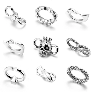 Set of nine assorted S925 sterling silver charms with heart, crown, and animal designs