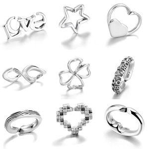 925 sterling silver charm collection including LOVE, heart, and clover connector pieces