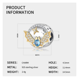 Detailed view of silver bat charm with blue heart stone and specific dimensions
