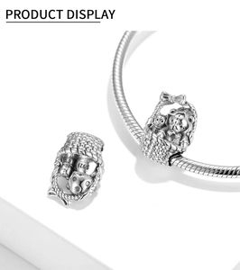 Detailed macro view of S925 sterling silver teddy bear basket charm showing S925 hallmark