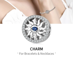 Makrodetail aus S925 Sterlingsilber Sonnen-Charm mit blauem Stein und weißen Zirkonia