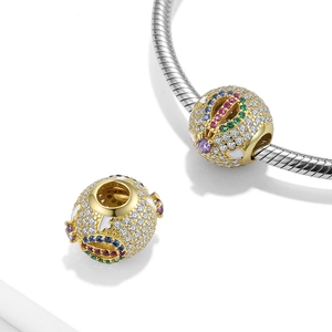 Detail of S925 silver hot air balloon charm with colorful stones and white enamel clouds