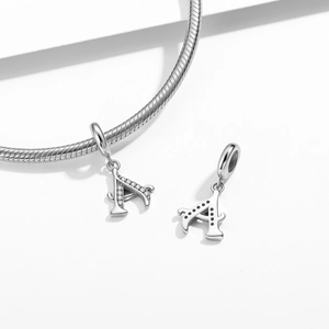 S925 sterling silver letter A charm with cubic zirconia and star cutout details