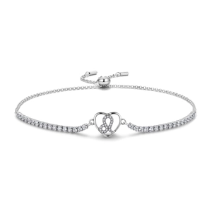 Macro shot of silver Leo zodiac heart bracelet with pavé cubic zirconia and slide clasp