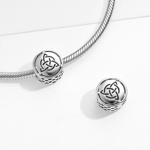 Celtic Triquetra knot charm in S925 sterling silver on a snake chain bracelet