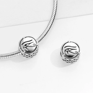 S925 sterling silver Eye of Horus hollow charm bead on a minimalist snake chain bracelet