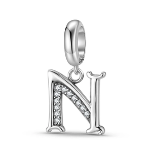 Macro shot of S925 sterling silver letter N charm with inlaid sparkling zircon stones