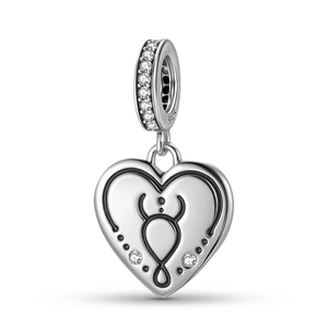 Close-up of S925 sterling silver Taurus heart charm with pavé cubic zirconia inlay