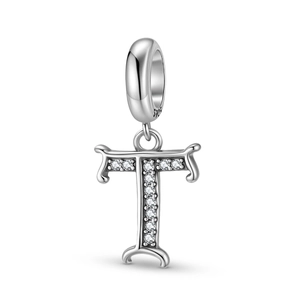 Macro shot of S925 sterling silver stamp on letter T pendant with clear zircons