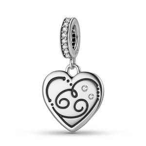 Detail of S925 sterling silver heart charm with black enamel zodiac sign and zircons