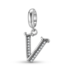Macro shot of S925 sterling silver letter V charm with cubic zirconia inlay details