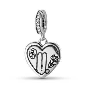 Macro detail of S925 sterling silver Virgo zodiac heart charm with cubic zirconia