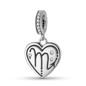 Macro shot of S925 sterling silver Scorpio heart charm with zircon inlay and S925 stamp