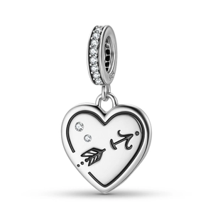 Close-up of S925 sterling silver heart charm with black enamel and sparkling zircons