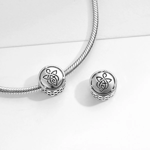 S925 sterling silver Celtic knot bead charm on a silver snake chain bracelet