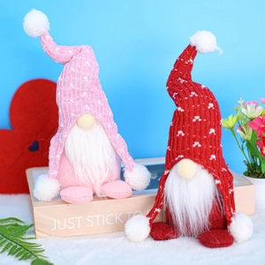 Handmade Valentine Gnomes with knitted long hats and white heart embroidery decor