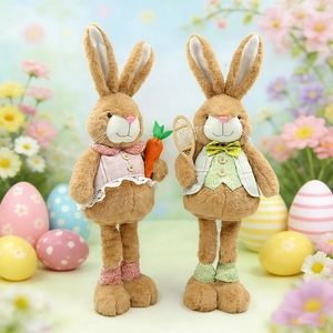 Easter plush bunny figurines in pink and green outfits with long legs and props