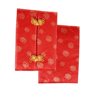 Detail of red brocade tissue box with golden Shou character and butterfly knot closure
