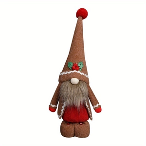 Detailed view of ginger-bread gnome featuring brown felt hat with holly leaf embroidery