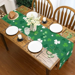 St. Patrick's Day table runner with green clover patterns and festive dining decor