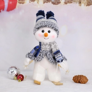 Christmas snowman figurine with blue knit hat, wooden skis, and poles for winter decor