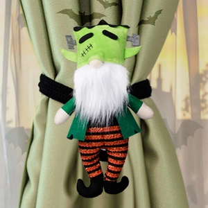 Detail of Frankenstein gnome curtain tieback with green velvet head and sequin striped legs