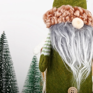 Detail of green gnome wine bottle cover featuring long beard and fuzzy brown cap texture