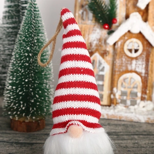 Knitted Christmas gnome hanging ornament with striped hat and white beard for tree decor