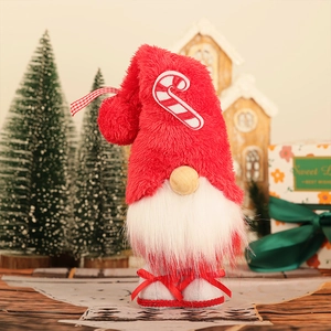 Standing Christmas gnome doll with red hat and candy cane design for holiday home decor