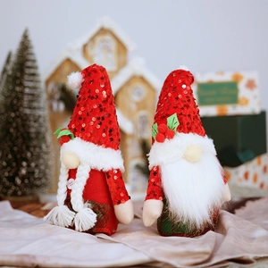 Christmas gnomes with red sequin hats and knit bodies for festive holiday home decor