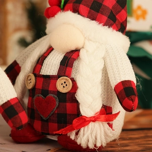 Lighted Christmas gnome doll with red buffalo plaid hat and long white braids decor