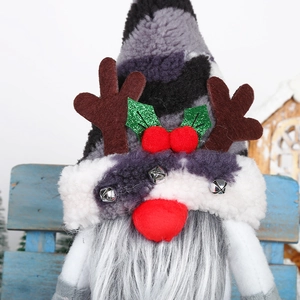 Christmas gnome plush with reindeer antlers and stripes, festive holiday table decor