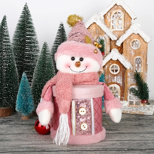 Pink snowman Christmas candy jar with sequined base and plush hat for holiday gifting