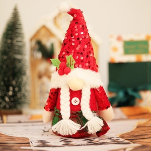 Detail of sequined gnome hat and braided white hair with holly leaf accents