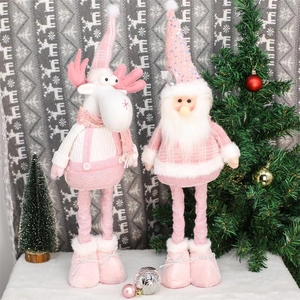 Pink and white Christmas plush elf dolls set featuring Santa and reindeer holiday ornaments