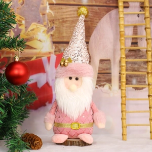 Gnome de Noël rose en peluche avec bonnet à paillettes et base en bois naturel