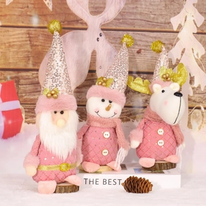 Ensemble peluches de Noël roses avec Père Noël, bonhomme de neige et renne pailleté