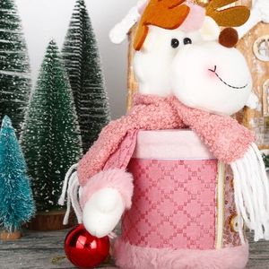 Close-up of pink quilted Christmas reindeer gift jar with golden sequined antlers