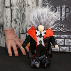 Standing vampire gnome doll with grey hair and black red cloak for Halloween decor