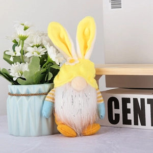 Detailed view of plush Easter bunny gnome with yellow ears and striped knit arms