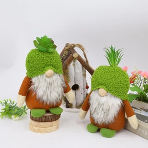 Green plush gnomes with succulents on hats and white beards for home decor