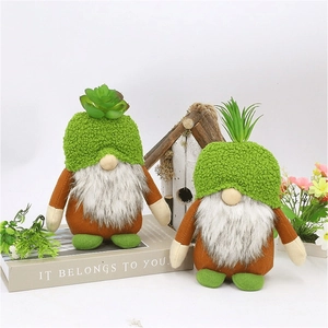 Detail of Christmas gnomes featuring green succulent hats and white faux fur beards