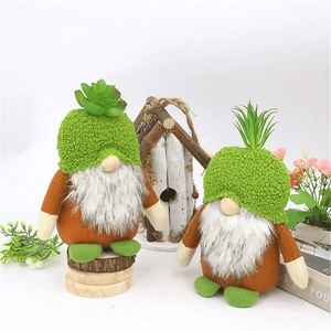Detailed view of forest gnome plushies with succulent hats and soft white beards