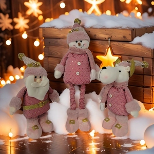 Ensemble de poupées de Noël roses et dorées avec Père Noël, bonhomme de neige et renne