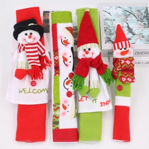 Close-up of 3D snowman fridge handle covers with Welcome and Let It Snow text