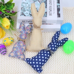 Plush Easter fabric bunny figurines with floral and polka dot patterns for holiday decor
